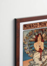 Aranżacja wnętrza, na ścianie wisi plakat w ramce: Monaco-Monte-Carlo Alfons Mucha Art Nouveau