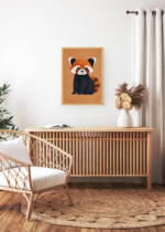 Aranżacja wnętrza, na ścianie wisi plakat w ramce: panda ruda ilustracja do pokoju dziecięcego