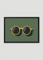 Plakat w drewnianej czarnej ramce: okulary przeciwsłoneczne na zielonym tle retro