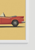 Zbliżenie na detale plakatu oprawionego w drewnianą białą ramkę od Plakatello®: do pokoju dziecięcego czerwony kabriolet retro vintage auto klasyczny