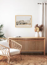 Aranżacja wnętrza, na ścianie wisi plakat w ramce: Miasto Bakkus Egipt Giovanni Battista Belzoni