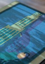 Zbliżenie na detale plakatu: Woolworth Building nocą Nowy Jork art deco vintage