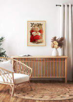 Aranżacja wnętrza, na ścianie wisi plakat w ramce: vintage dziewczyna w czerwonej sukni Ethel Reed