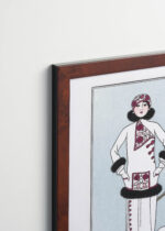 Aranżacja wnętrza, na ścianie wisi plakat w ramce: Art Deco George Barbier zimowa elegantka 1913