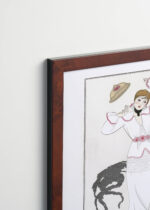 Aranżacja wnętrza, na ścianie wisi plakat w ramce: George Barbier 1912 elegancka dama Art Deco