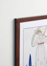 Aranżacja wnętrza, na ścianie wisi plakat w ramce: Le Cyprès et la Rose George Barbier art déco