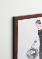 Aranżacja wnętrza, na ścianie wisi plakat w ramce: Art Deco L'Empire du Monde George Barbier