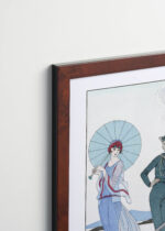 Aranżacja wnętrza, na ścianie wisi plakat w ramce: Romance sans paroles Kobieta z Marynarzem George Barbier art déco