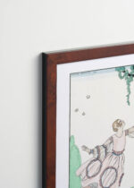 Aranżacja wnętrza, na ścianie wisi plakat w ramce: Papillons Motyle George Barbier 1921 art deco