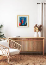 Aranżacja wnętrza, na ścianie wisi plakat w ramce: Art Deco George Barbier Ostatnie dni Pompei