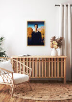 Aranżacja wnętrza, na ścianie wisi plakat w ramce: Grant Wood portret mężczyzny amerykański realizm