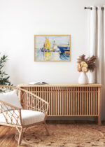 Aranżacja wnętrza, na ścianie wisi plakat w ramce: Henri-Edmond Cross port śródziemnomorski pointylizm