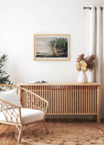 Aranżacja wnętrza, na ścianie wisi plakat w ramce: Długodzioby batalion - John James Audubon