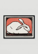 Plakat w drewnianej czarnej ramce: królik Julie de Graag 1916 czerwone tło vintage