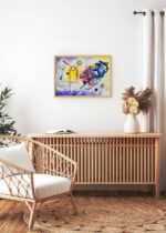Aranżacja wnętrza, na ścianie wisi plakat w ramce: Kandinsky Żółty-czerwony-niebieski 1925 abstrakcja