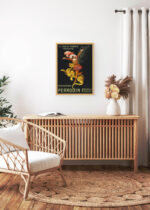 Aranżacja wnętrza, na ścianie wisi plakat w ramce: Perrouin Frères Leonetto Cappiello tancerka