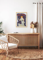 Aranżacja wnętrza, na ścianie wisi plakat w ramce: Odette Dulac Leonetto Cappiello Art Nouveau