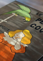 Zbliżenie na detale plakatu: Dziewczynka z papugą Leonetto Cappiello vintage