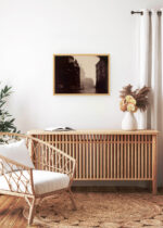 Aranżacja wnętrza, na ścianie wisi plakat w ramce: Paryż Panthéon 1924 E. Atget fotografia vintage