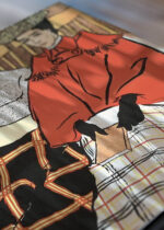 Zbliżenie na detale plakatu: Kobieta i mężczyzna siedzący pod kocami (1897)