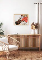 Aranżacja wnętrza, na ścianie wisi plakat w ramce: Kobieta i mężczyzna siedzący pod kocami (1897)