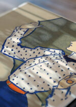 Zbliżenie na detale plakatu: Kobieta trzymająca parasol nad głową (1897)