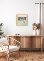 Aranżacja wnętrza, na ścianie wisi plakat w ramce: Mężczyzna grający w golfa (ok. 1890-1907)